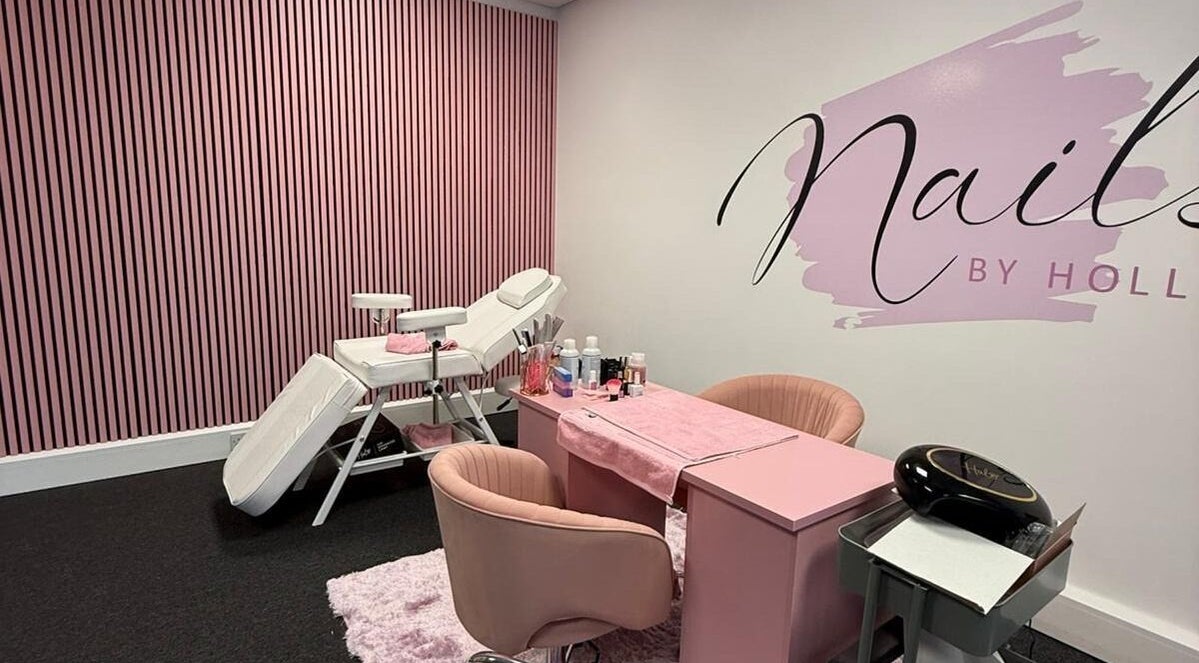 Chic interior of Nails By Holly in Great Blakenham, England, featuring a pink-themed manicure station.