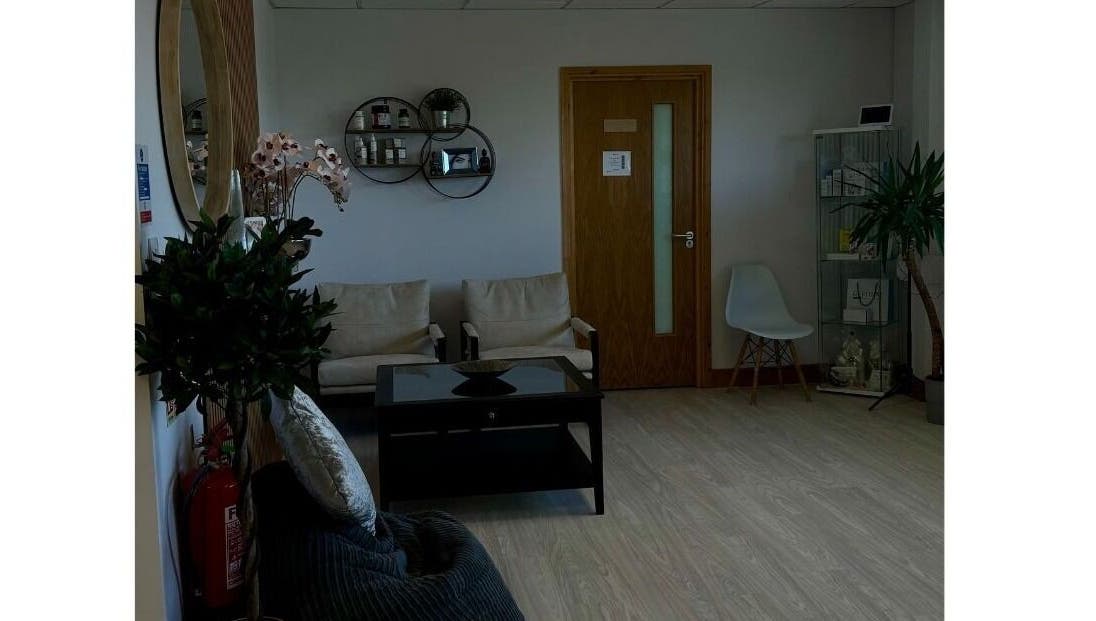 Cozy waiting area in Sledge Sport Therapy, Bristol, England, GB with seating and decor.