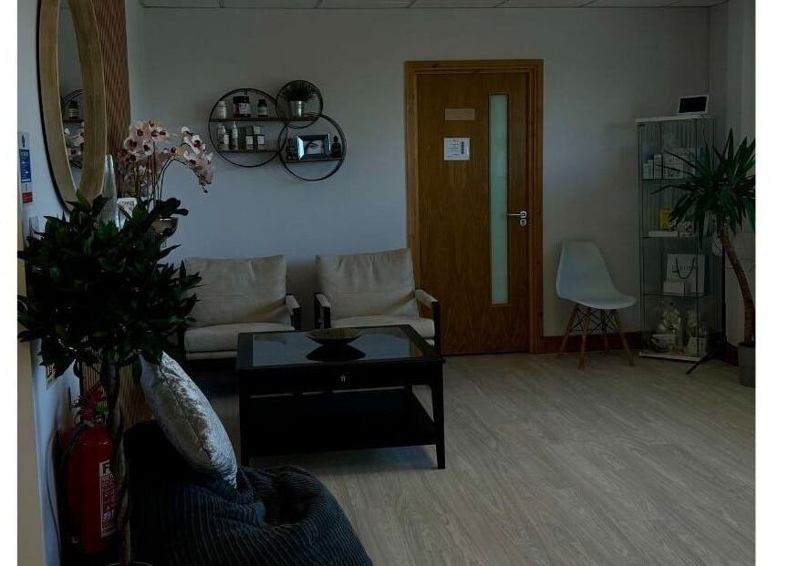 Cozy waiting area in Sledge Sport Therapy, Bristol, England, GB with seating and decor.