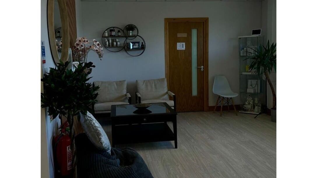 Cozy waiting area in Sledge Sport Therapy, Bristol, England, GB with seating and decor.