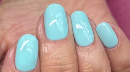 Freshly manicured nails with aqua polish at Cured By Jess, Sandbach, England, GB.