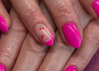 Vibrant pink manicure with cherry design at Cured By Jess, Sandbach, England, GB.