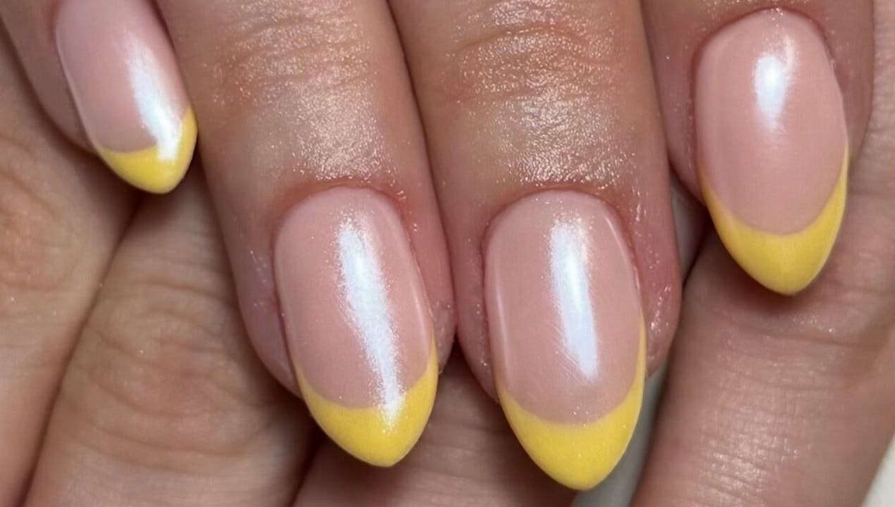 Yellow-tipped manicured nails at Cured By Jess, Sandbach, England, GB.