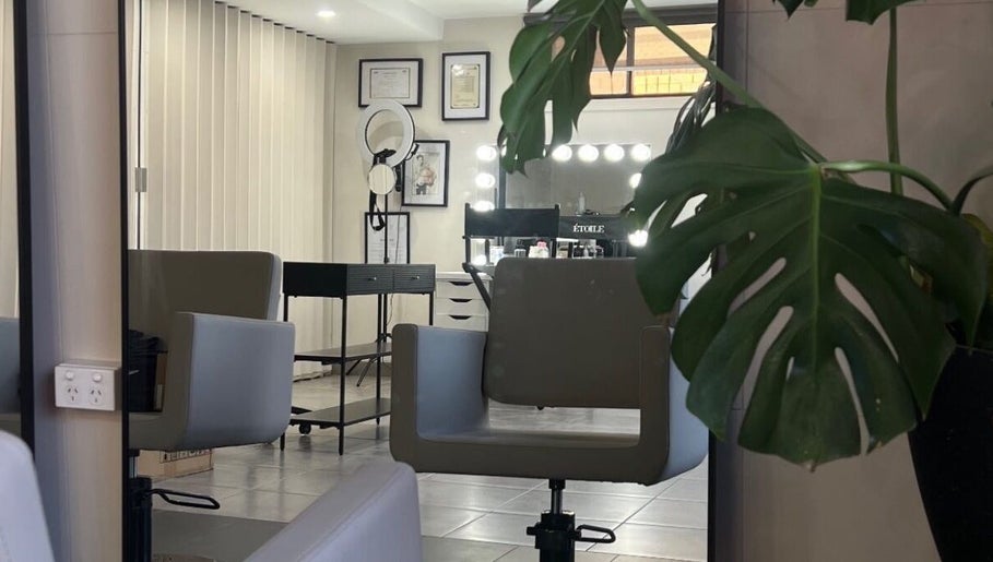 Modern makeup studio at Zee’s Makeup Artistry, Melbourne, Victoria, AU, featuring sleek styling chairs and decor.
