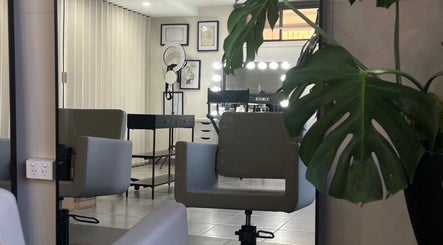 Modern makeup studio at Zee’s Makeup Artistry, Melbourne, Victoria, AU, featuring sleek styling chairs and decor.