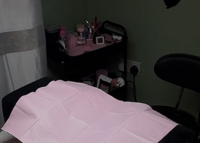 Beauty treatment setup at Ari cosmetics in Royal Wootton Bassett, England, GB, showcasing a relaxing atmosphere.
