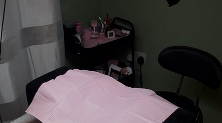 Beauty treatment setup at Ari cosmetics in Royal Wootton Bassett, England, GB, showcasing a relaxing atmosphere.