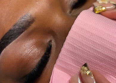 Expert eyebrow styling at Ari Cosmetics, Royal Wootton Bassett, England, GB showcasing precision and beauty.