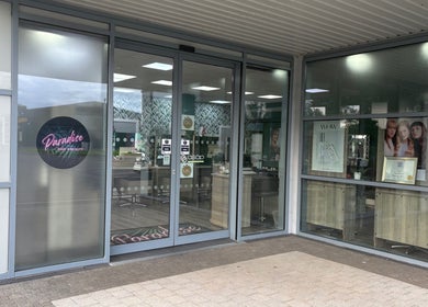 Elegant entrance of At Your Fingertips salon in Tralee, County Kerry, IE, showcasing modern styling and welcoming vibes.