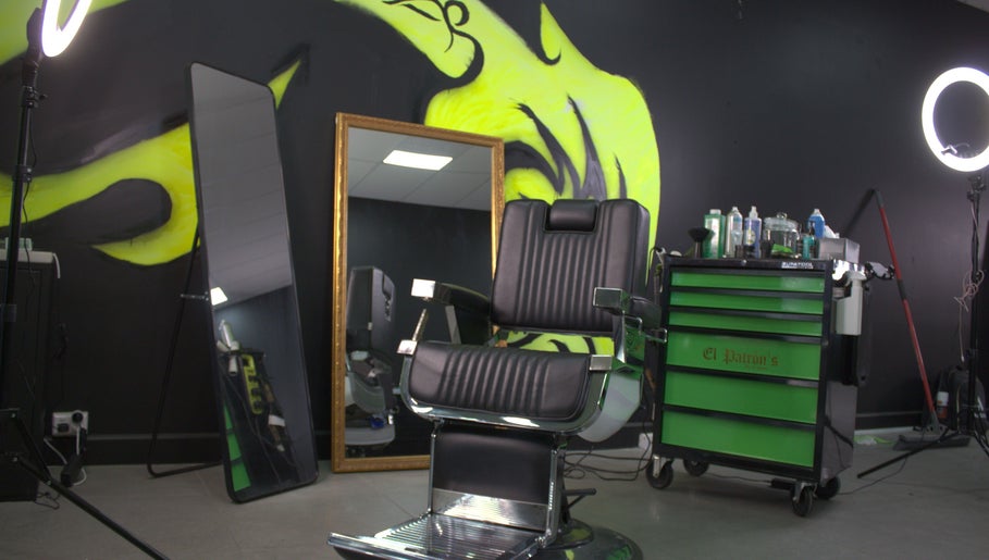 Stylish salon chair and decor at Fortuin Studio, Geelong, Victoria, AU with modern green accents.