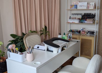 Cozy nail station at The Nail Aangan, Narre Warren South, Victoria, AU, showcasing manicure essentials and decor.