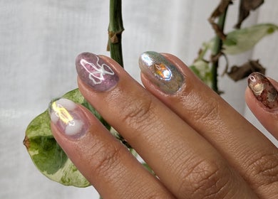 Intricate nail art at The Nail Aangan, Narre Warren South, Victoria, AU showcasing unique, colorful designs.