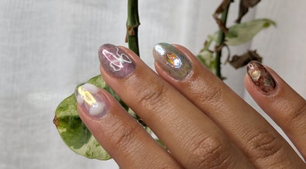 Intricate nail art at The Nail Aangan, Narre Warren South, Victoria, AU showcasing unique, colorful designs.