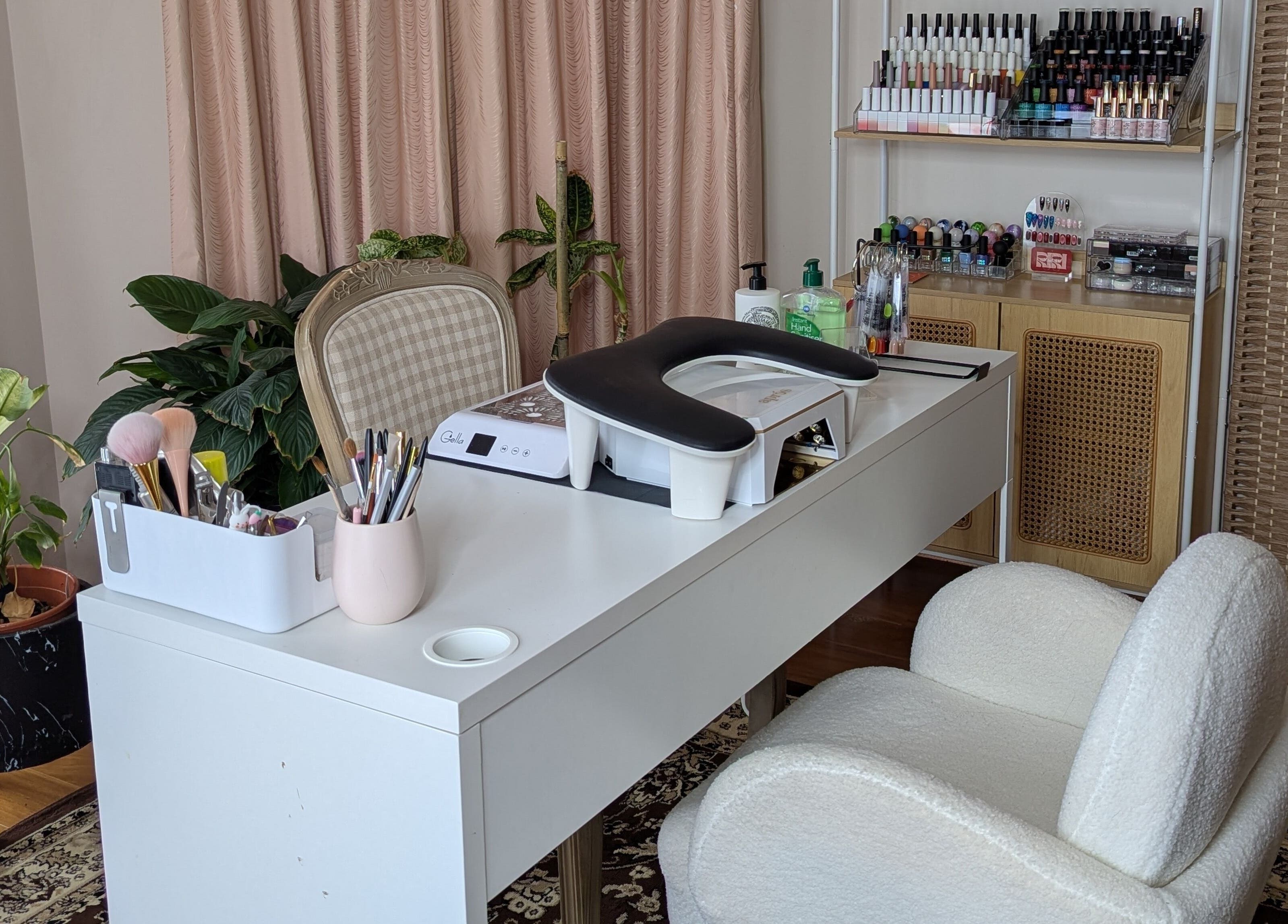 Modern nail station at The Nail Aangan, Narre Warren South, Victoria, AU showcasing tools and polish collection.