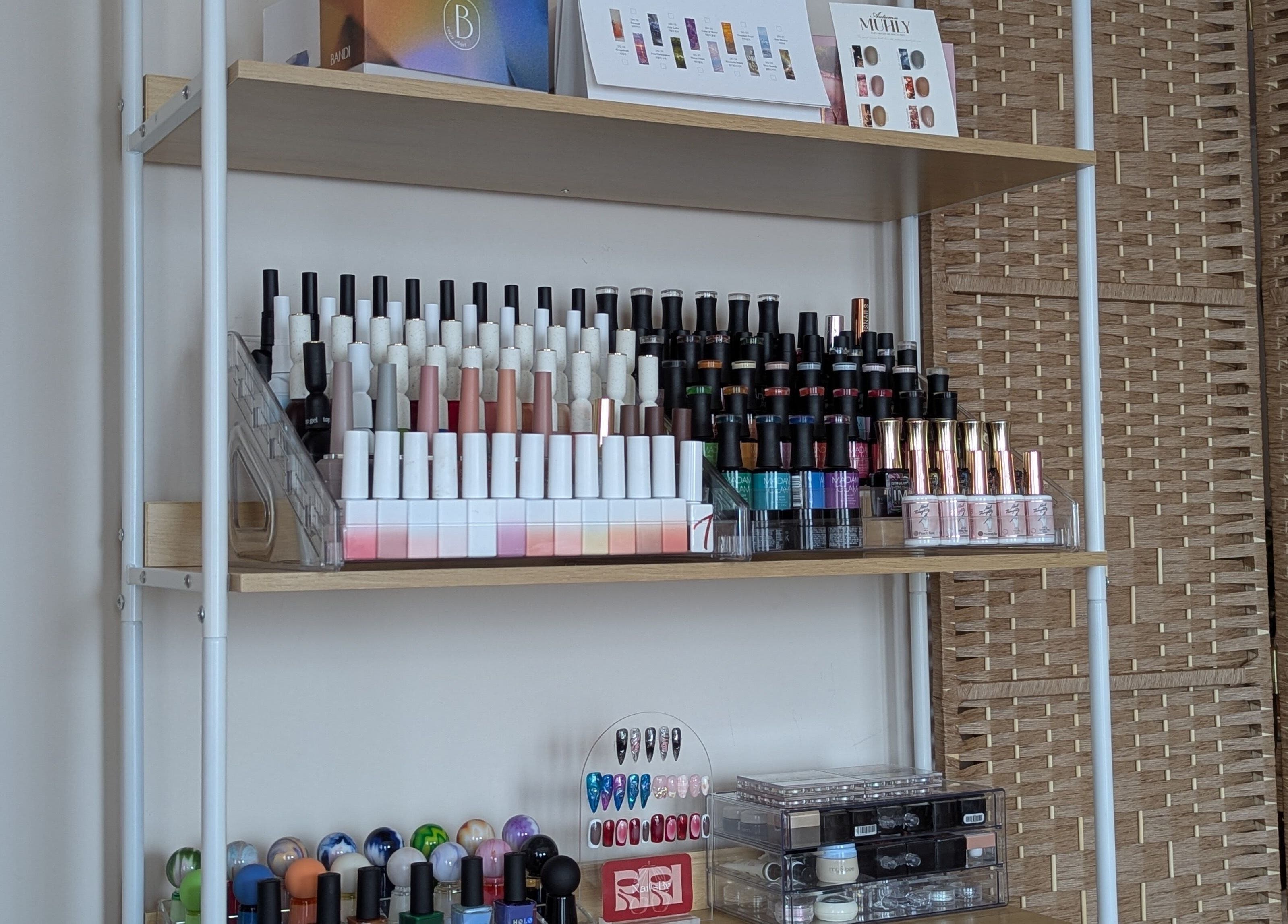 Colorful nail polish display at The Nail Aangan in Narre Warren South, Victoria, AU showcases variety.