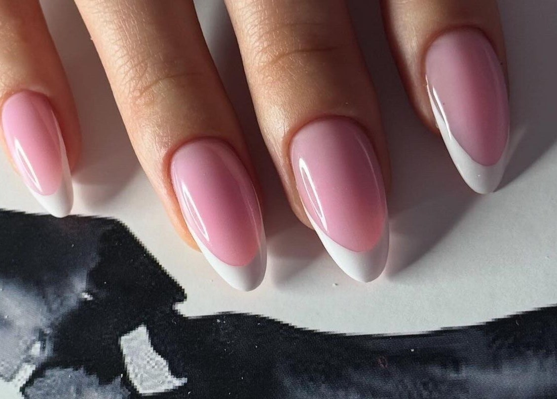 Elegant pink and white French manicure at ZInailSTUDIO, Milton Keynes, England, GB.