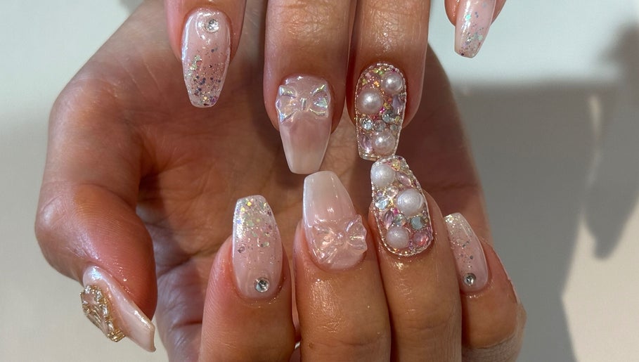 Elegant nail art with rhinestones and pearls at Naily Atelier, West Ryde, New South Wales, AU.