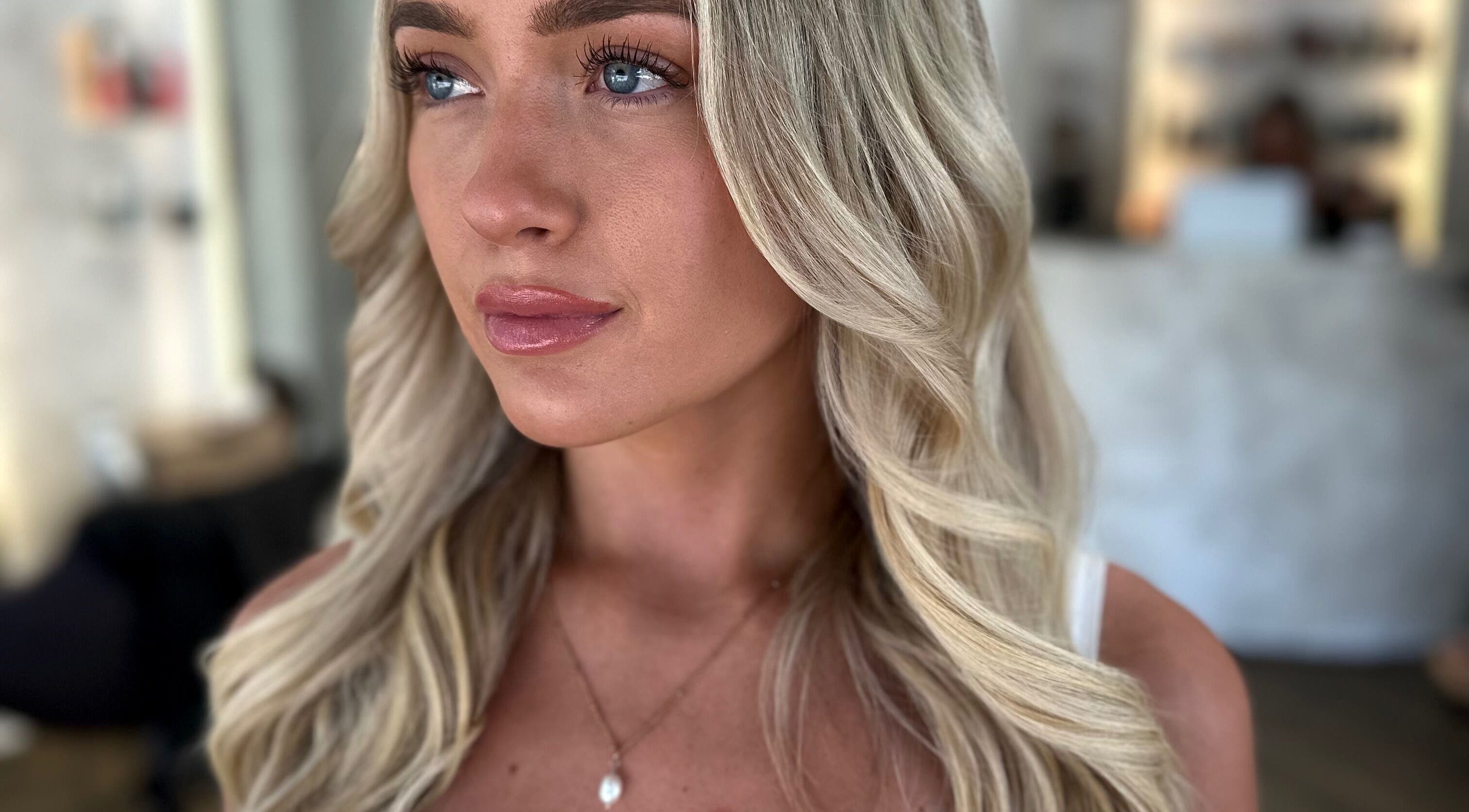 Woman with styled blonde hair at Beauty by Land, Mijas, Andalucía, ES.