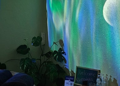Serene therapy room at Healing Touch, Belfast, Northern Ireland, GB with calming lights and plants.