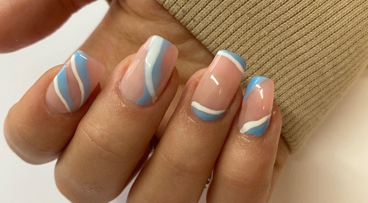 Stylish blue and white nail art at Beauty Bar | FY6 in Poulton-le-fylde, England, GB.