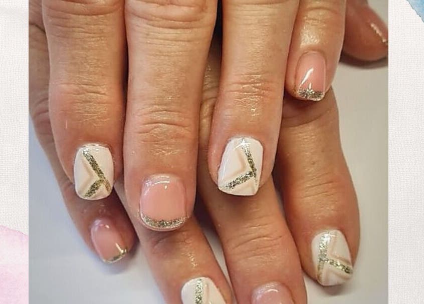 Stylish nail art at Beauty Bar | FY6, Poulton-le-fylde, England, GB showcasing glitter and geometric designs.