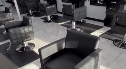 Modern salon chairs at Jk Braiding Spot in Arlington, Texas, US, showcasing a sleek and professional setup.