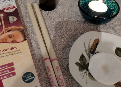 Ear candling setup at Azure Wellness, Combe Martin, England, GB for a relaxing experience.