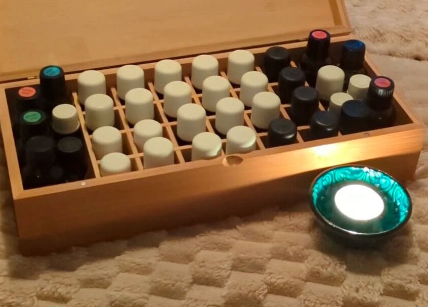 Aromatherapy oils and candle at Azure Wellness, Combe Martin, England, GB create a peaceful atmosphere.