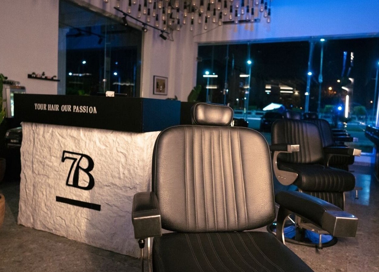 Stylish salon chairs and modern decor at HANOSA, Ismailia Governorate, EG. Ideal for luxury beauty services.
