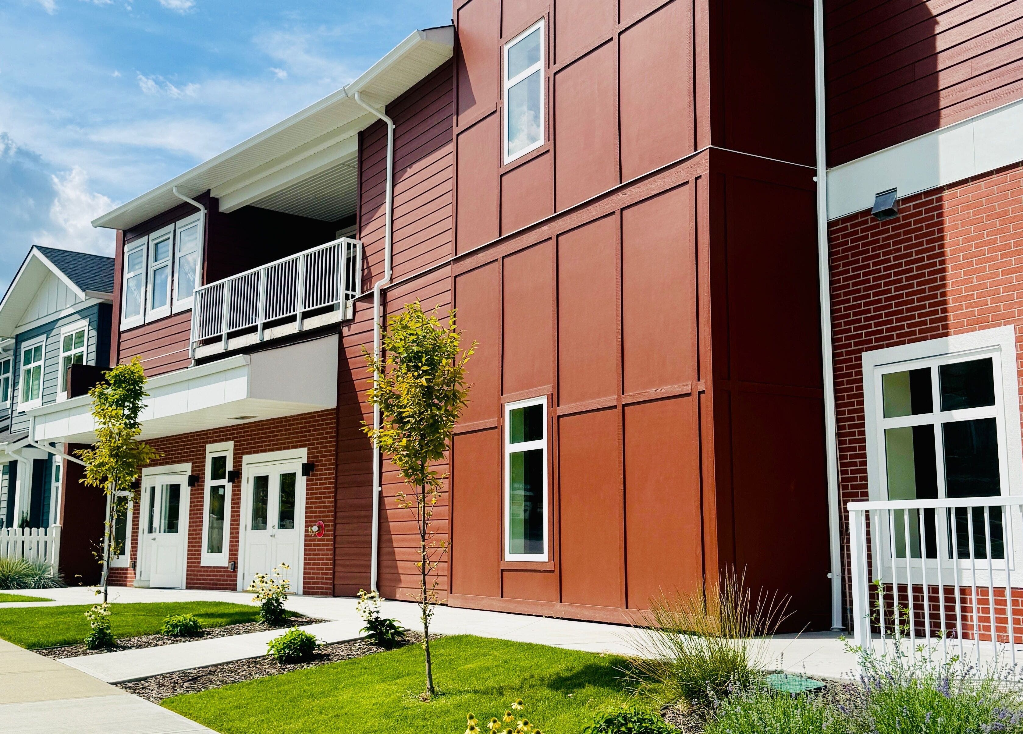 Modern red brick building of Jessie Grant - Ember Studio in Kelowna, British Columbia, CA.