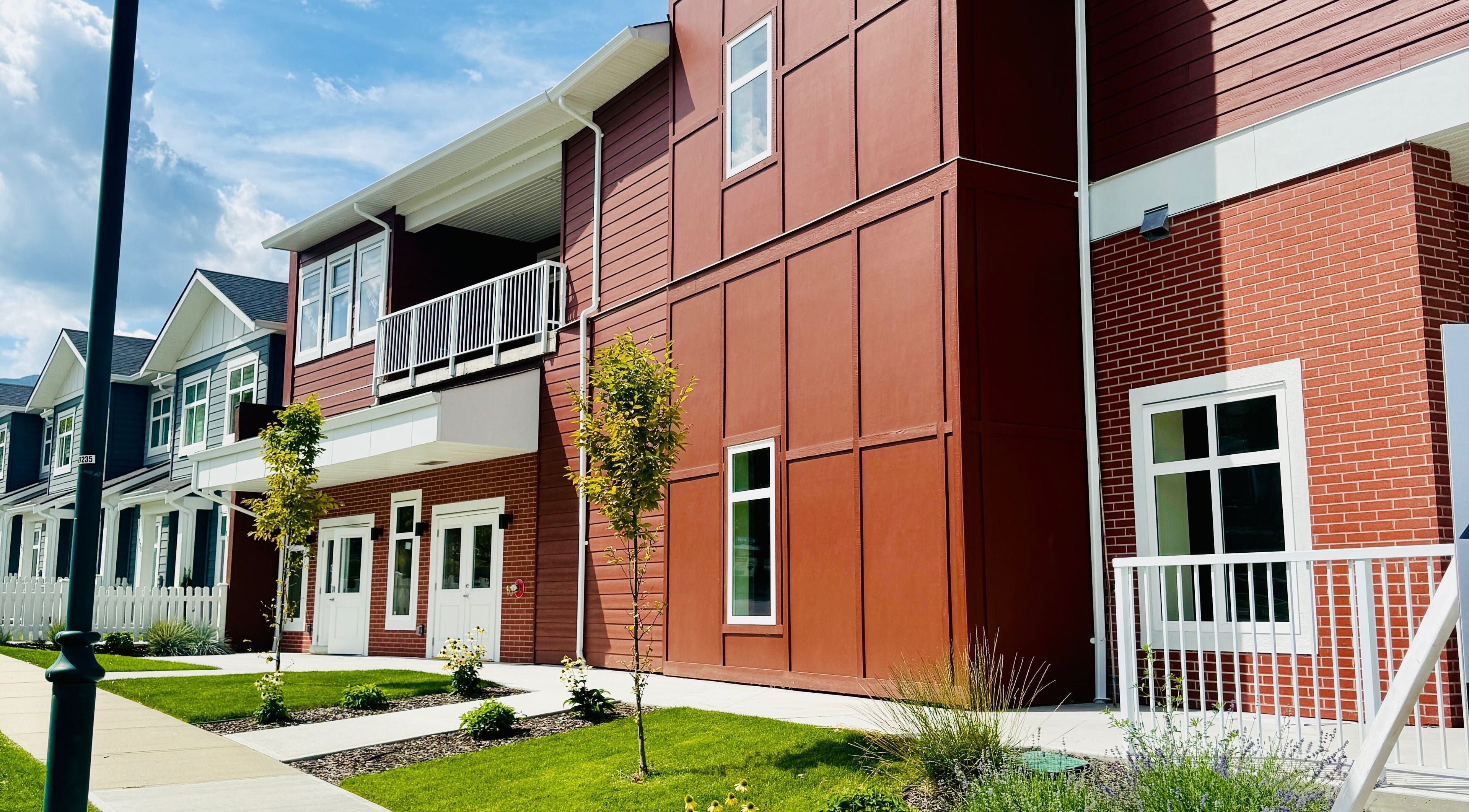 Modern red brick building of Jessie Grant - Ember Studio in Kelowna, British Columbia, CA.