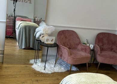 Pink velvet chairs and elegant decor at The Fairy Eyelashes, London, England, GB.