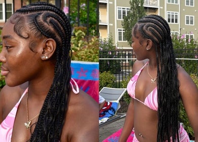 Woman in stylish braids at Shegostyless, Boston, Massachusetts, US, enjoying a sunny day.