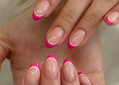 Stunning pink French manicure at By Lucy Jane in Bognor Regis, England, GB, showcasing elegant nail art.