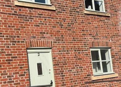 Front view of Sculpt & Pout SPMU with a classic brick facade in Congleton, England, GB.