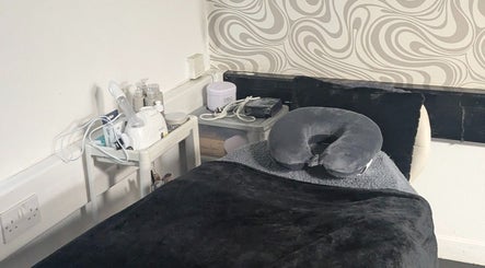 Relaxing treatment room at F.A.B by Louise, Cambuslang, Scotland, GB featuring a comfy massage bed.