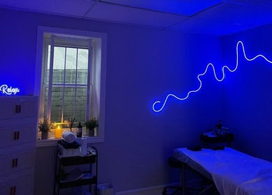 Tranquil room with neon lights at 416Skin Aesthetics & Academy in Toronto, Ontario, CA. Relaxing ambiance.