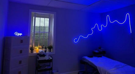 Tranquil spa room with blue neon lights at 416Skin Aesthetics & Academy, Toronto, Ontario, CA.