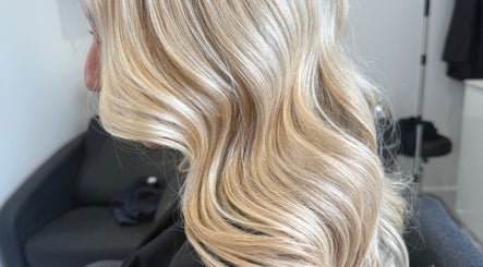Blonde wavy hairstyle at Hair by Grace Loveday, London, England, GB.