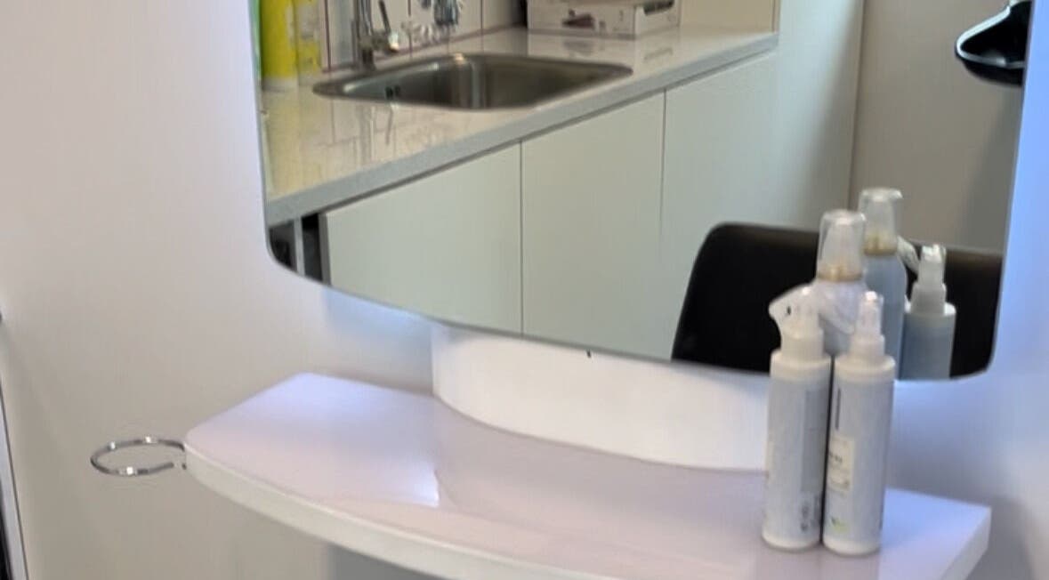 Stylish salon mirror and products at Wonderland Hair Peterhead, Peterhead, Scotland, GB.