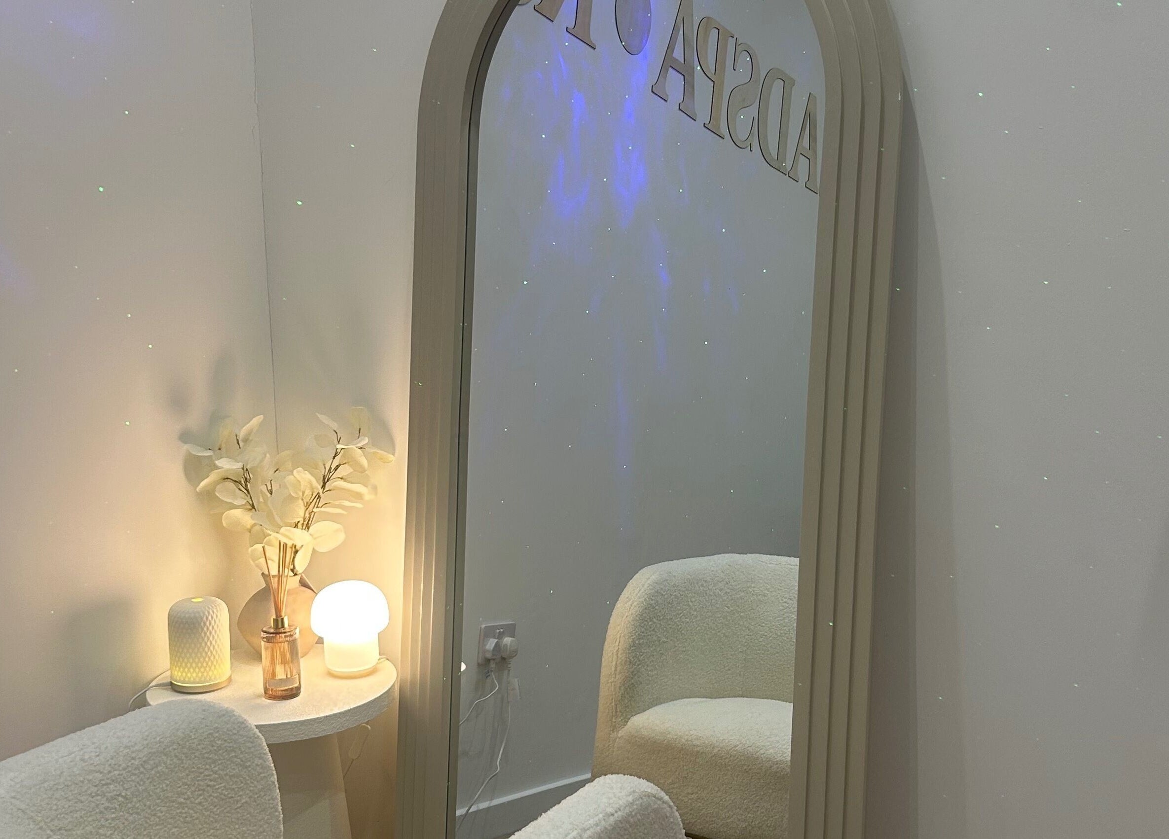 Inviting space in The HeadSpa Room, Glasgow, Scotland, GB with a plush chair and ambient lighting.
