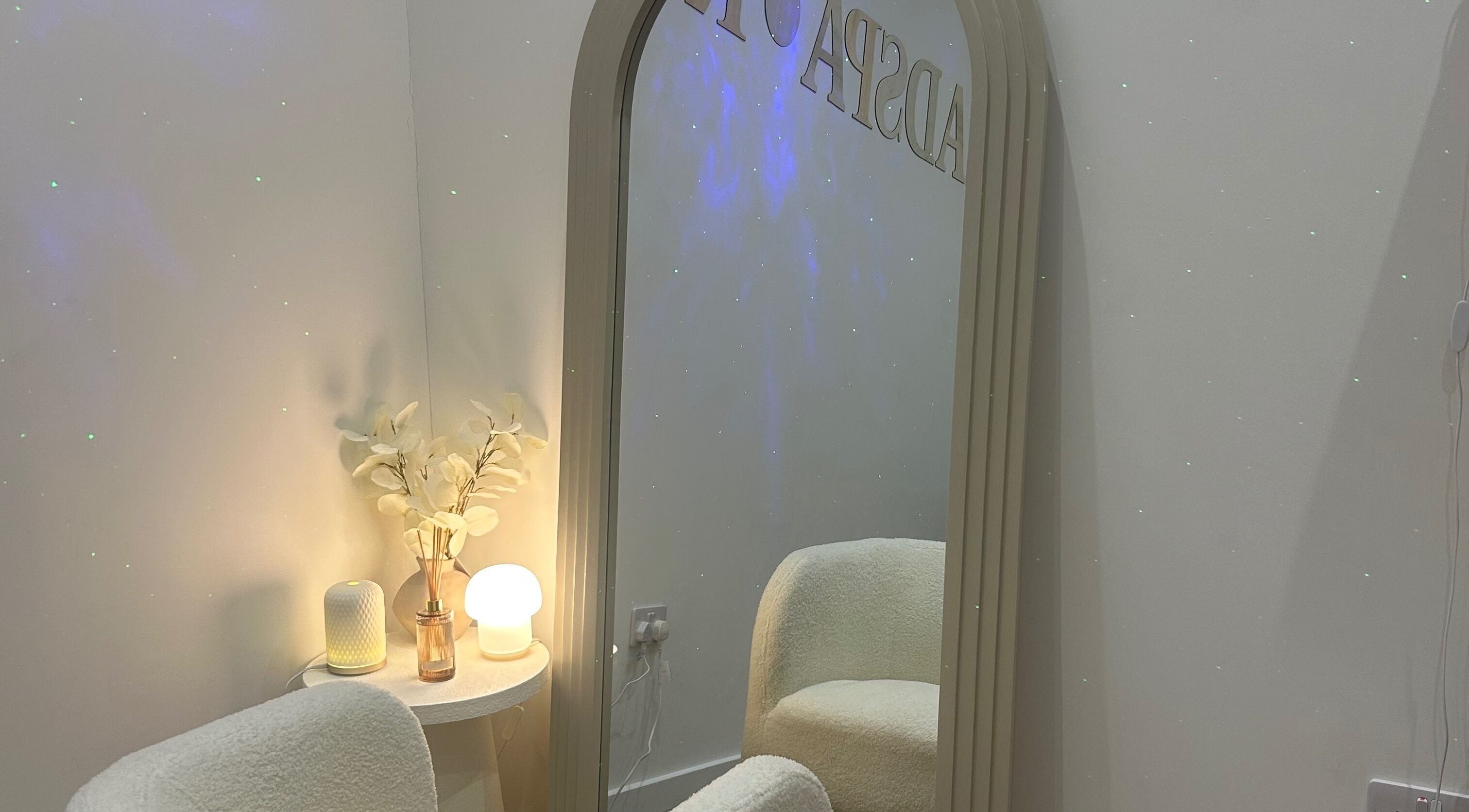Inviting space in The HeadSpa Room, Glasgow, Scotland, GB with a plush chair and ambient lighting.