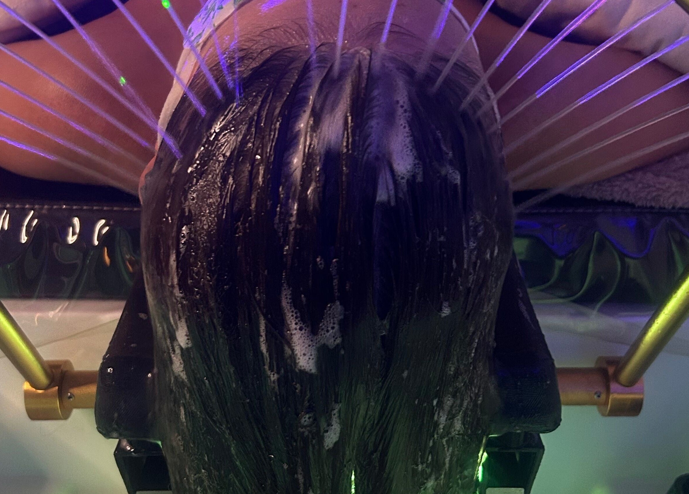 Relaxing hair wash in The HeadSpa Room, Glasgow, Scotland, GB. Enjoy a luxurious scalp treatment under soothing lights.