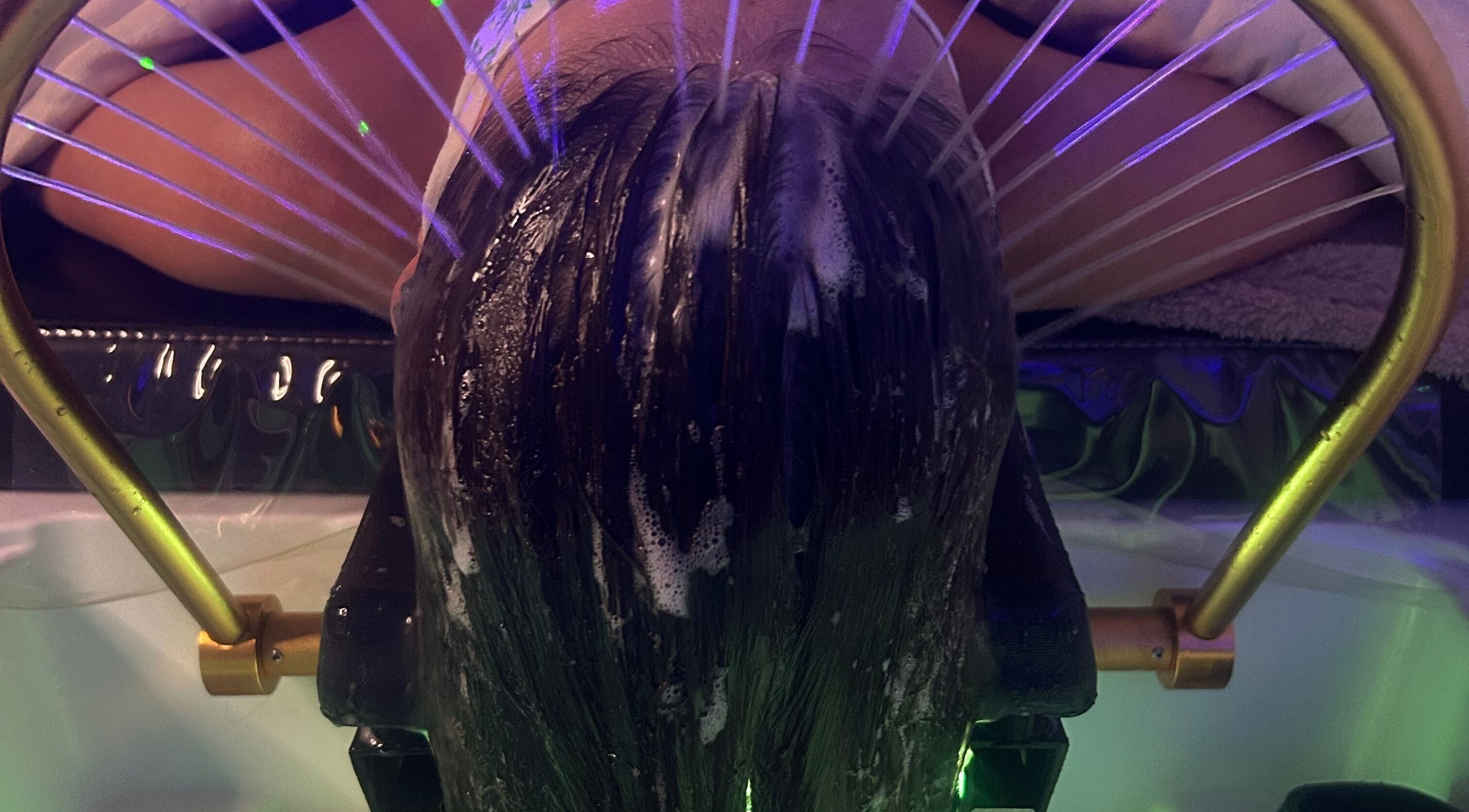 Relaxing hair wash in The HeadSpa Room, Glasgow, Scotland, GB. Enjoy a luxurious scalp treatment under soothing lights.