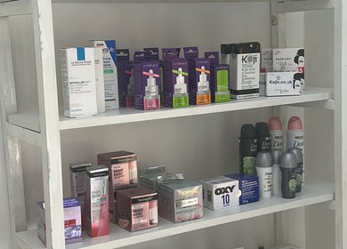 Shelves at The Beauty Edit, Harare stocked with skincare and beauty products.