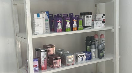 Shelves at The Beauty Edit, Harare stocked with skincare and beauty products.
