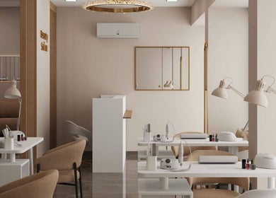 Chic modern interior of Double Space, Lisboa, Lisboa, PT with beige chairs and white tables.