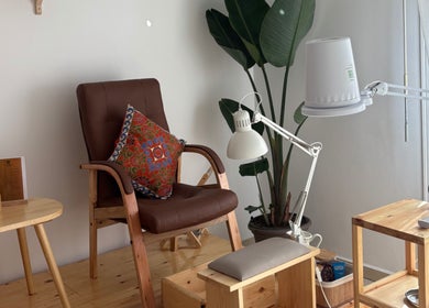 Comfortable seating with a vibrant pillow at Ordo Beauty Salon, Rabat, Rabat-salé-kénitra, MA.