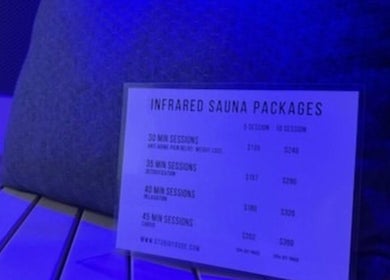 Infrared sauna package details at T&S Paradise Touch Spa, San Jose, California, US, highlighted in blue light.