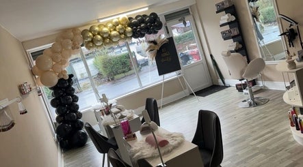 Elegant beauty salon at Enchantedbykait, Farnworth, England, GB featuring stylish decor and comfy chairs.